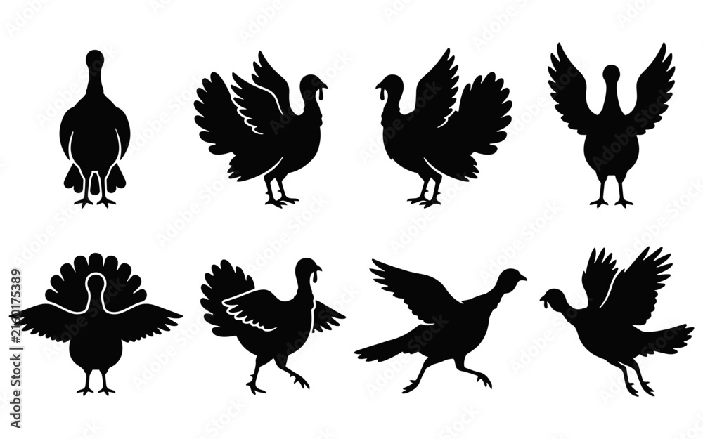 Fototapeta premium A collection of black silhouettes featuring various poses of turkeys isolated on a clean white background for design projects