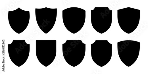 Black shield shapes set for security protection logo and icon design with various flat forms.
