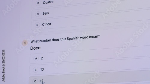 Student using AI chatbot on computer to solve math problems and study English and Spanish online. Modern education with AI assistant, chatbot, AI agent, e-learning and homework.