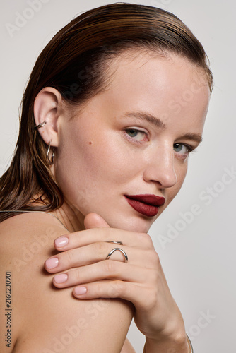 Quadro su tela Charming young woman displays elegance in stylish chic attire with captivating a