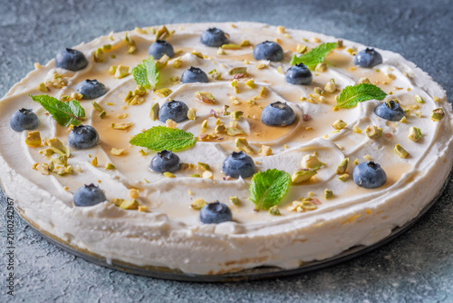 Rustic No Bake Mascarpone Cheesecake Topped With Blueberries Pistachios Maple Syrup And Mint