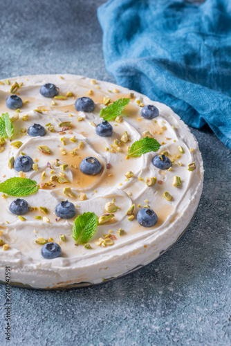 Rustic No Bake Mascarpone Cheesecake Topped With Blueberries Pistachios Maple Syrup And Mint