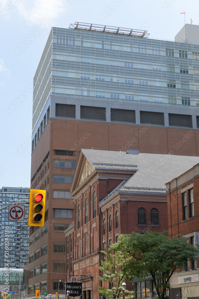 Fototapeta premium looking east on Shuter St to Massey Hall (178 Victoria St), an event venue, and St. Michael's Hospital (30 Bond St), Toronto