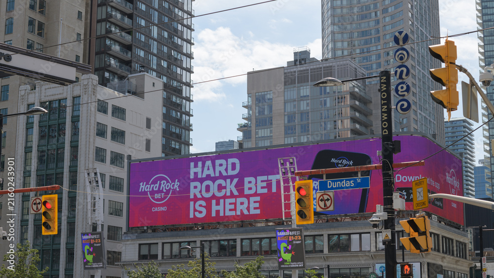 Naklejka premium digital sign facing Sankofa Square for Hard Rock Bet, an online gambling app, Toronto