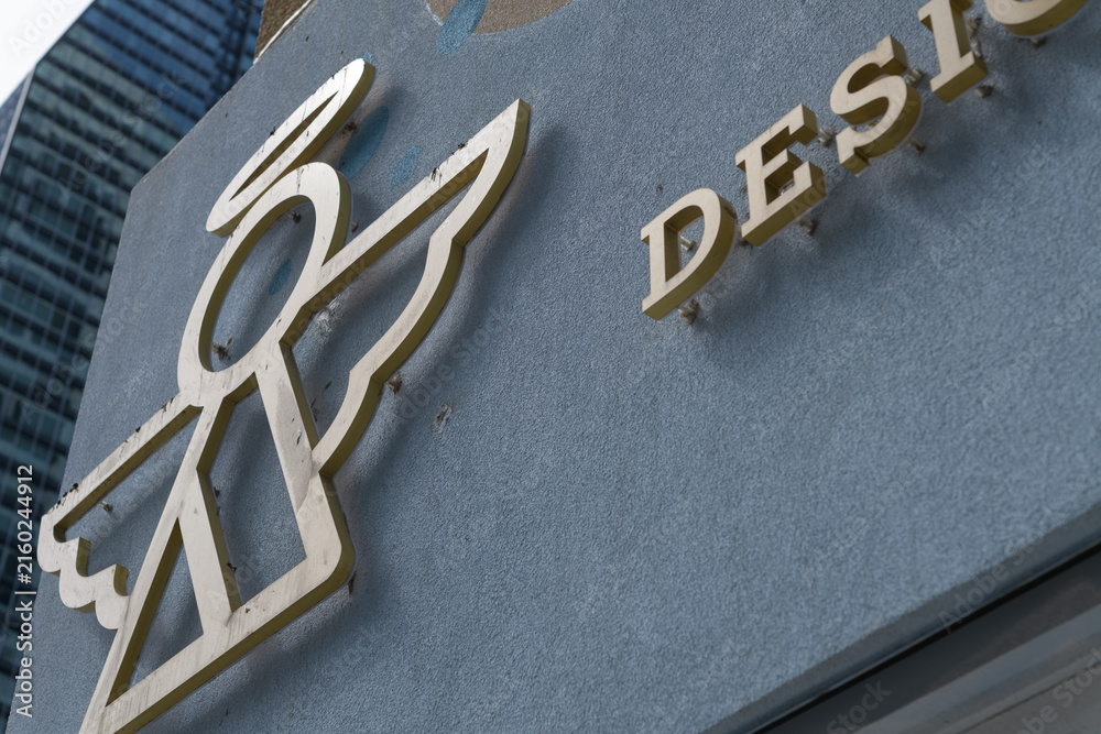 Fototapeta premium detail of building exterior and sign of VaVa Designer Cakes located at 620 Yonge St, Toronto