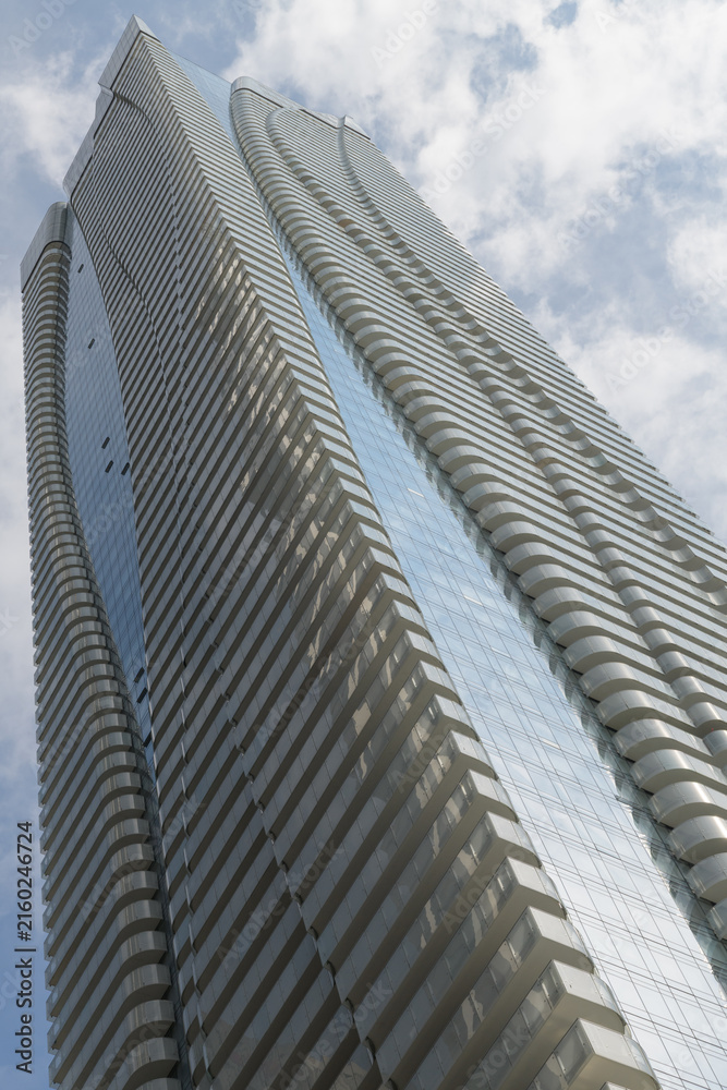 Fototapeta premium an upward view of One Bloor East designed by Hariri Pontarini Architects, a mixed-use commercial and residential tower at Yonge St, Toronto