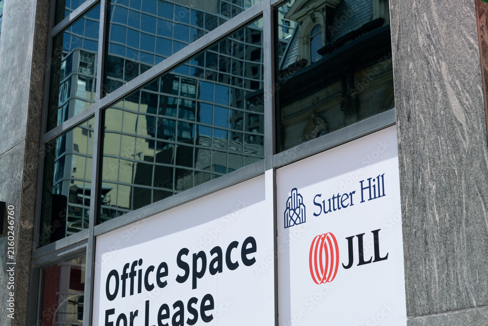 Naklejka premium Office Space For Lease sign of Sutter Hill, a real estate owner, developer, and property manager in Toronto