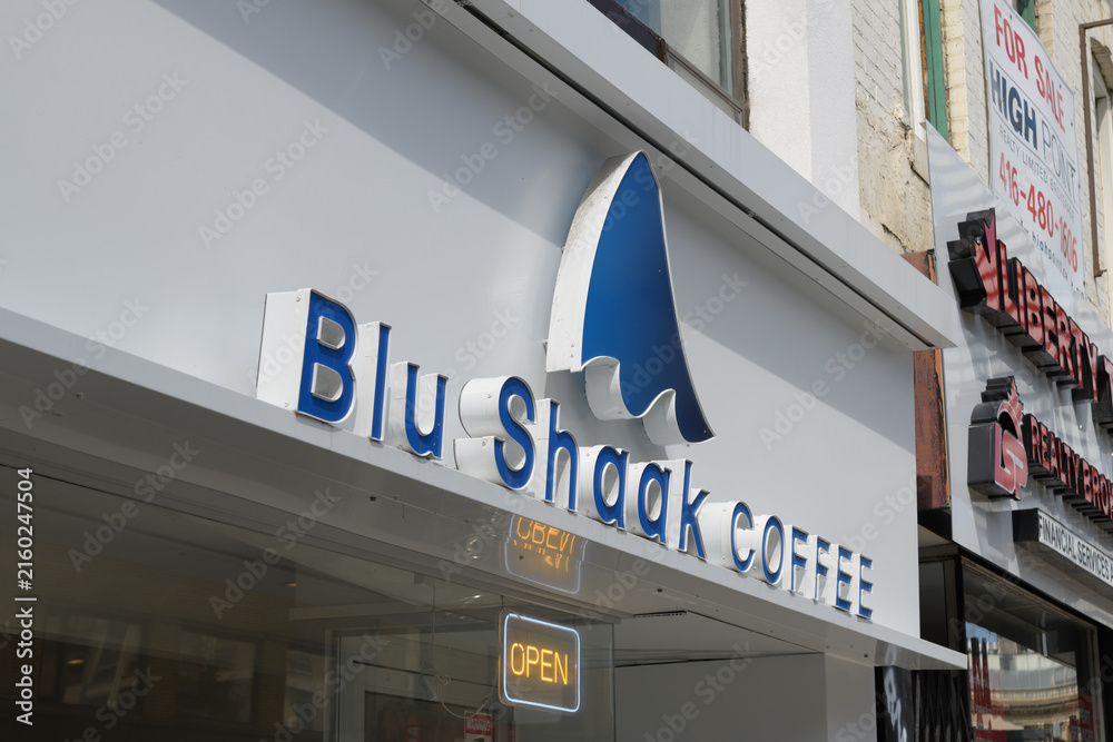 Fototapeta premium exterior building facade and sign of Blu shaak coffee located at 684 Yonge St, Toronto