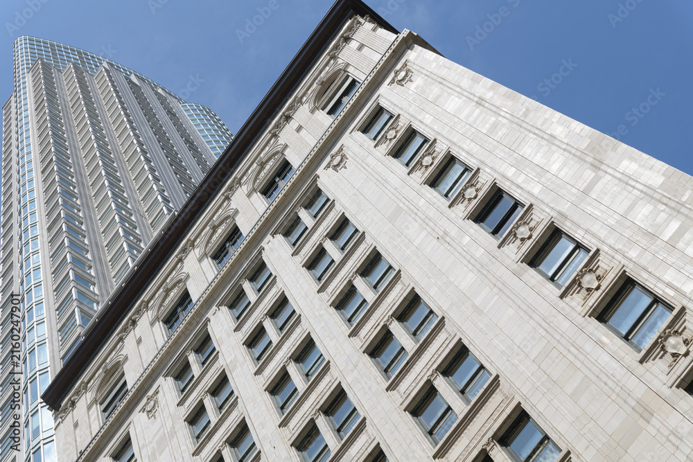 Fototapeta premium oblique upward view of One King West Hotel & Residence, a four star hotel, located at King St W, Toronto