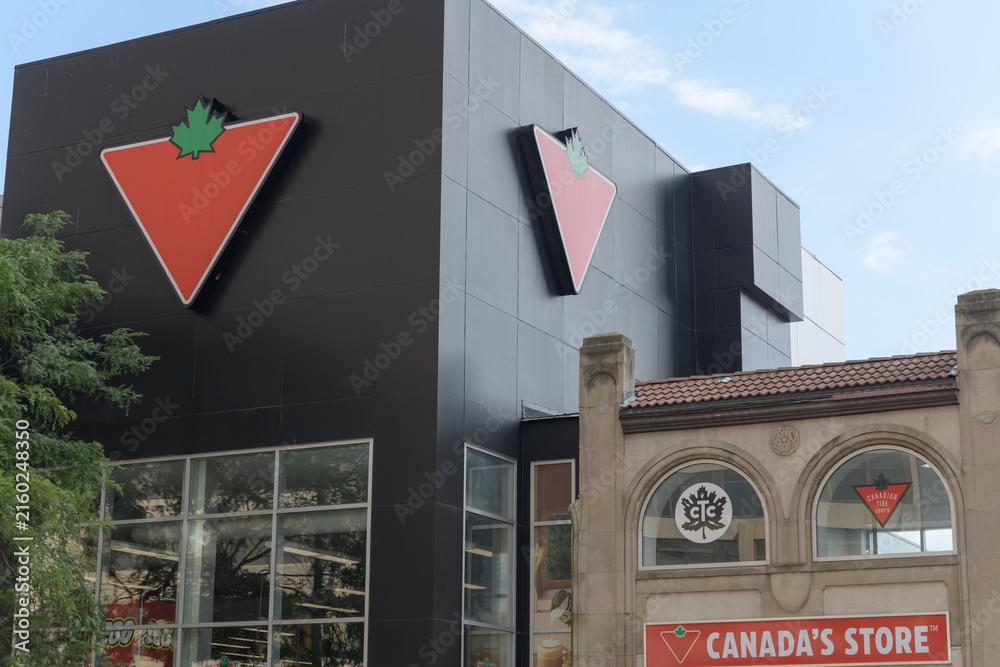 Fototapeta premium exterior building facade and signage at Canadian Tire, a department store, located here at 839 Yonge St, Toronto