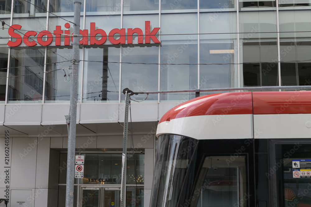 Fototapeta premium exterior building facade and sign of Scotiabank located here at 1 St Clair Av E, Toronto (512 St Clair streetcar)