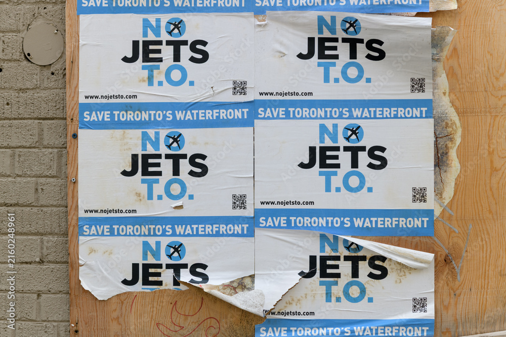 Fototapeta premium street posters pasted to a plywood hoarding in Toronto (No Jets, TO)