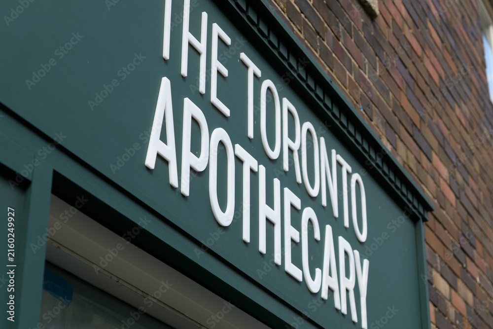Fototapeta premium ghost sign of The Toronto Apothecary located at 2463 Yonge St