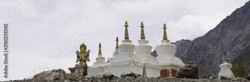 Buddha statue of Cho Rinpoche and stupas at Diskit monastery in Ladakh, India