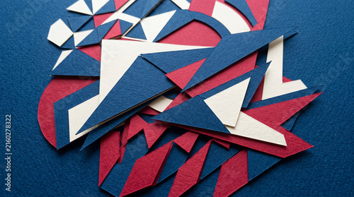 Abstract geometric composition of layered red, white, and blue paper shapes, representing a modern artistic design or patriotic motif