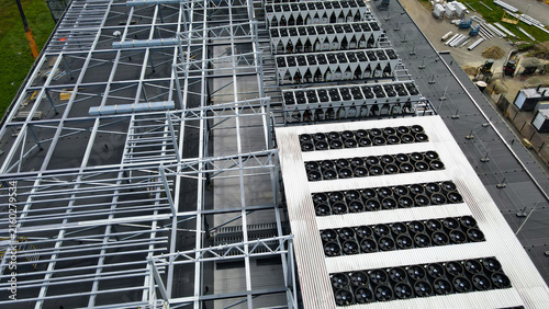 фотографія Data center rooftop under construction featuring structural framing alongside op