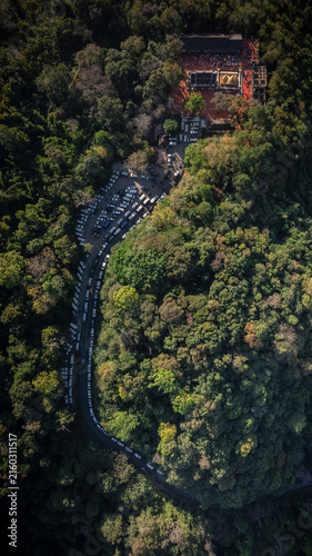 Obraz na plátne Mountain parking lot surrounded by dense forest at Doi Tung, Chiang Rai, serving visitors to Phra That Doi Tung in 2023