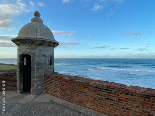 Fort wall sentry box above the Caribbean Sea. Bartizan or garita at Castillo San Felipe del Morro, San Juan, Puerto Rico. Icon appears on Puerto Rican license plates and quarters. 