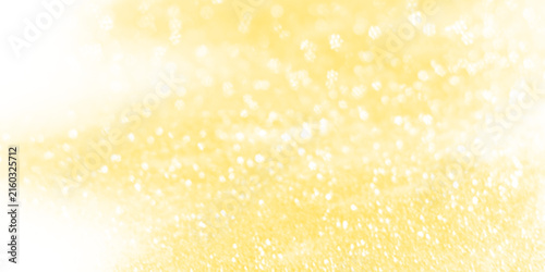 Golden abstract dust particles or glitter falling with a gradient effect on a transparent alpha channel background, creating a festive overlay texture