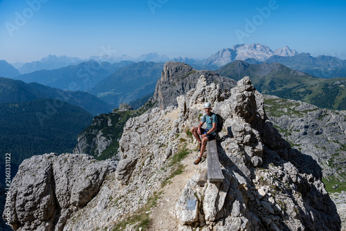 A man on the way to Monte Lagazuoi Piccolo. Alps, Dolomites, Italy.