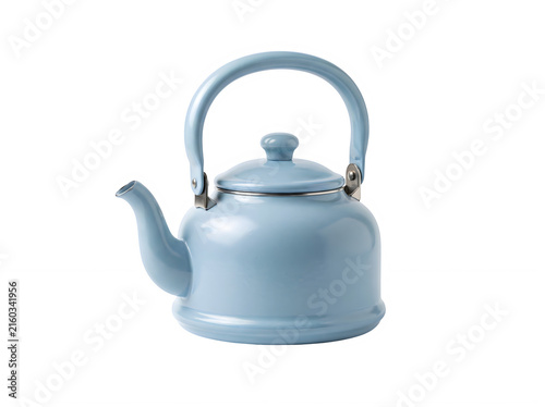 Light blue metal tea kettle for boiling water in a modern kitchen for making hot drinks and tea time