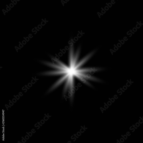 Bright starburst effect on a black background perfect for adding sparkle to designs