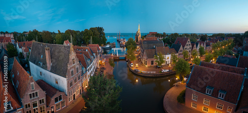 Panorama of Hoorn harbor canal and Hoofdtoren at dusk