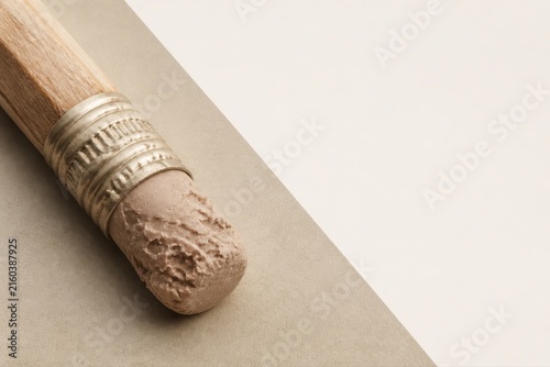 Soft beige eraser on pencil with clean copy space and minimal layout