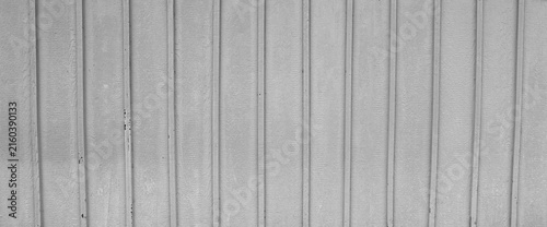 Canvastavla Gray painted board and batten wood siding in horizontal close-up, showing visibl