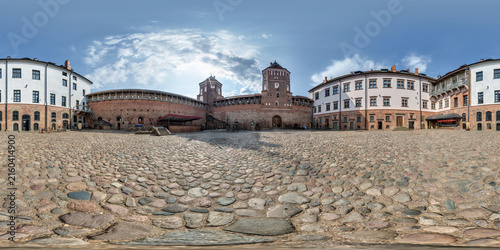 Fotografie full seamless spherical hdri 360 panorama near huge neo-gothic castle, defensive