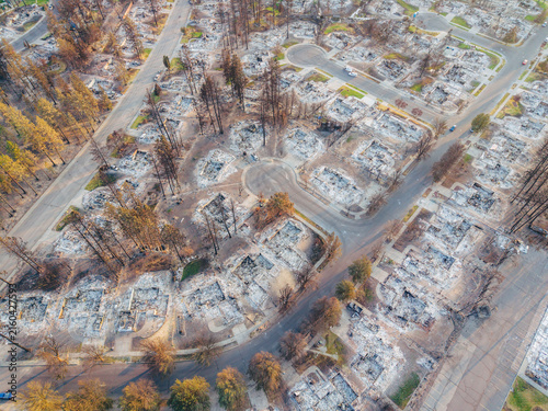 Aerial view of widespread wildfire destruction across a Spokane Washington residential neighborhood in 2026