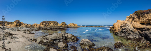 Panoramic view of a rocky California coastal cove