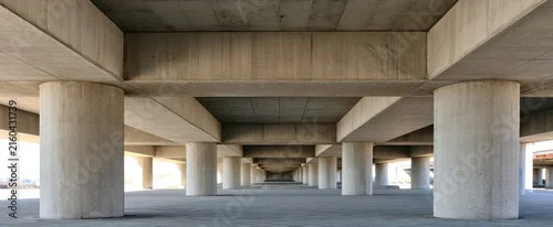 Panel kuchenny z motywem Modern urban architecture with concrete columns and symmetrical design for urban development projects