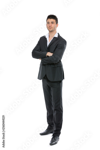 Young businessman portrait isolated on white background, looking away, full length