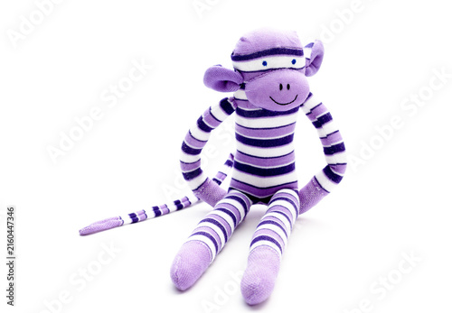 Monkey sock toy isolated on white background