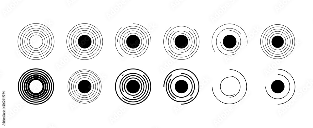 Fototapeta premium Abstract circular patterns with varying line thickness and solid centers in a clean presentation