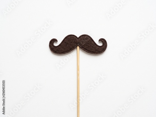 Brown felt mustache prop on a stick for Movember and photo booth party events.