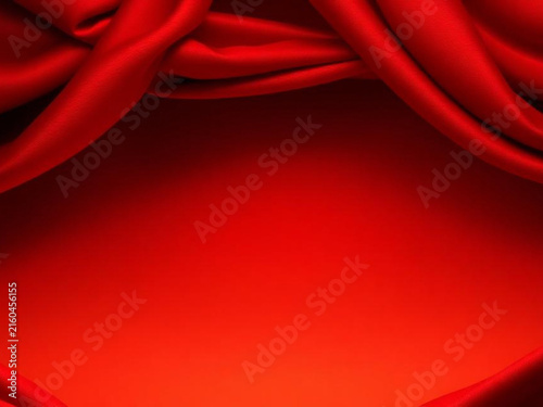 Red silk fabric with drapery folds forming a frame, luxury background, elegant stage curtain