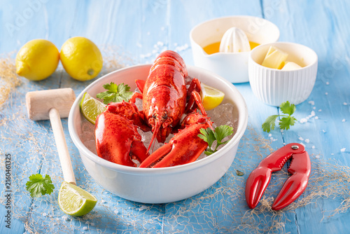 Cooked and tasty lobster served with orange sauce.