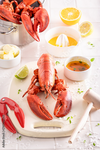 Teasty and fresh lobster with hammer and splitting tongs.