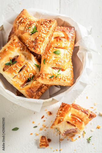 Hot and homemade sausage roll as a snack for breakfast.