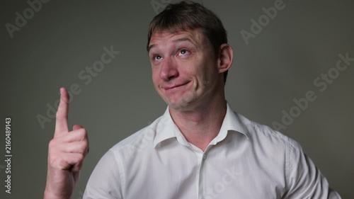 Businessman in a suit looking at the camera. Studio portrait isolated on a white background, suitable for business, stress andal concepts.	Businessman got idea
