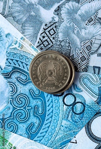 Obraz na płótnie Kazakhstani tenge money banknotes and coins on table