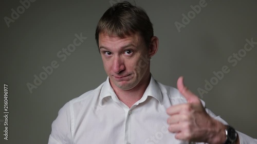 Businessman in a suit looking at the camera. Studio portrait isolated on a white background, suitable for business, stress andal concepts.	Businessman got idea

