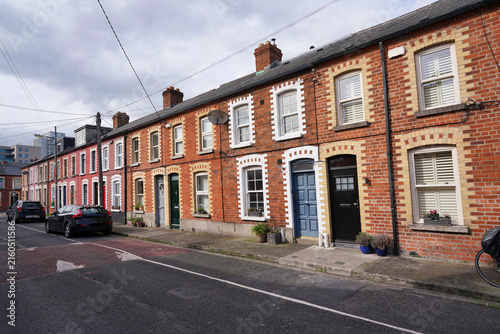 Modest brick row houses in central Dublin near the new high tech 
