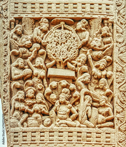 Aniconic Buddhist relief depicting the veneration of the sacred Bodhi Tree by devotees, nāga figures, and celestial beings, symbolizing the Enlightenment of the Buddha, from the Great Stupa, Sanchi