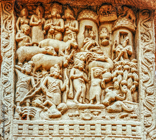 Buddhist narrative relief depicting a pastoral village scene with cattle, herdsmen, ascetics, river creatures, and rustic dwellings, from the Great Stupa Torana at Sanchi, Sanchi Stupa Complex, India
