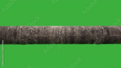 Concrete water pipe cracked and leaking green screen