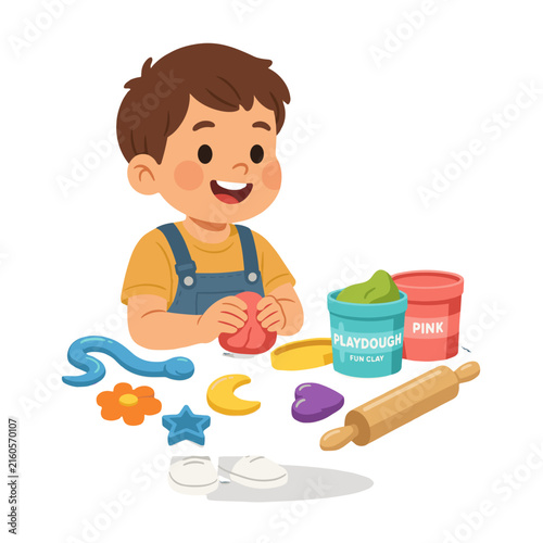 A young boy happily playing with colorful playdough and toys.