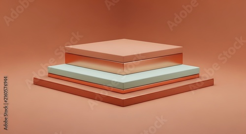 Stack of three colorful hardcover books on wooden surface